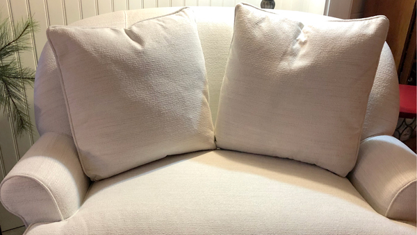 Cream love seat